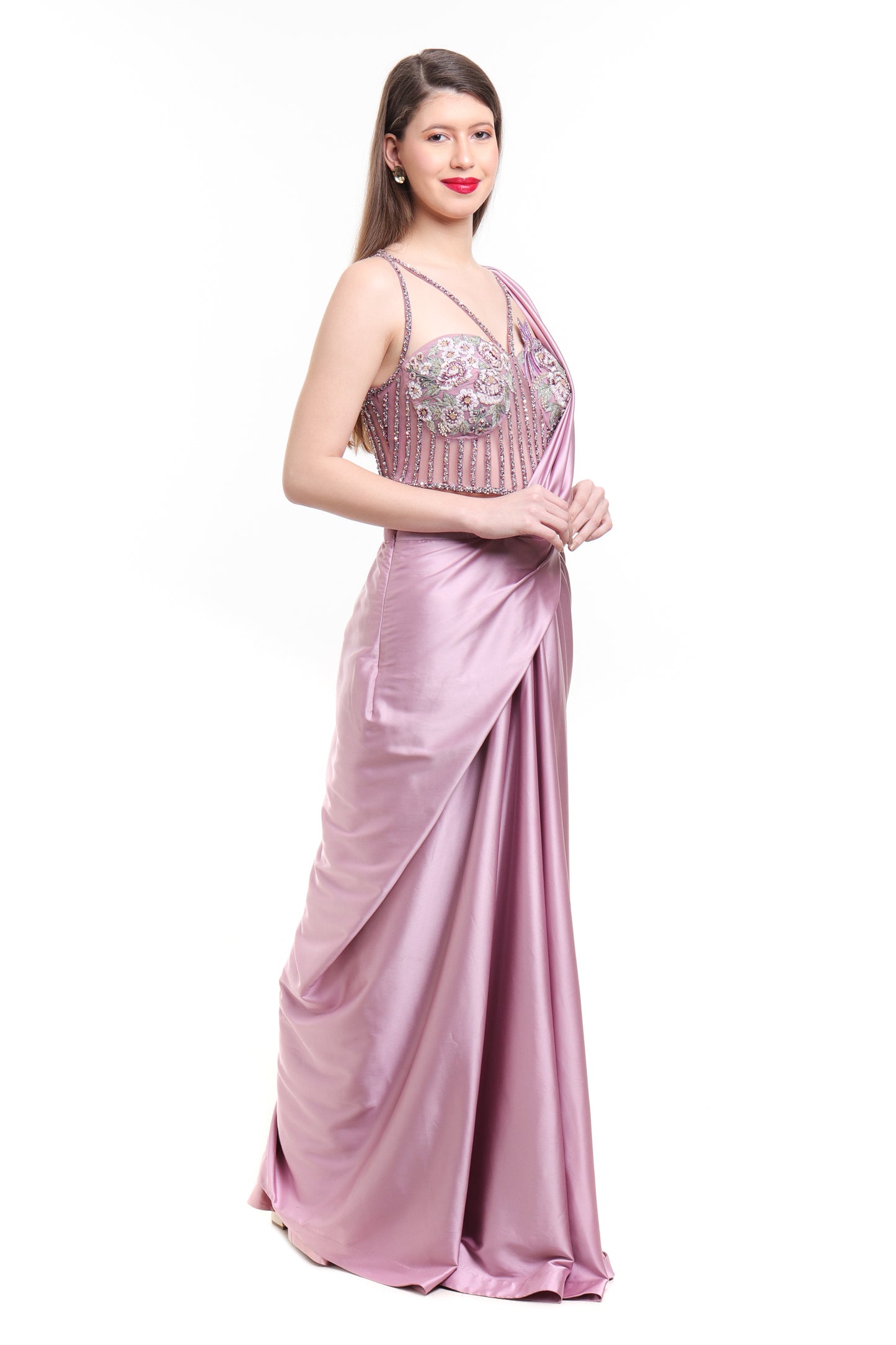 Mauve pre draped saree with embroidered corset blouse
