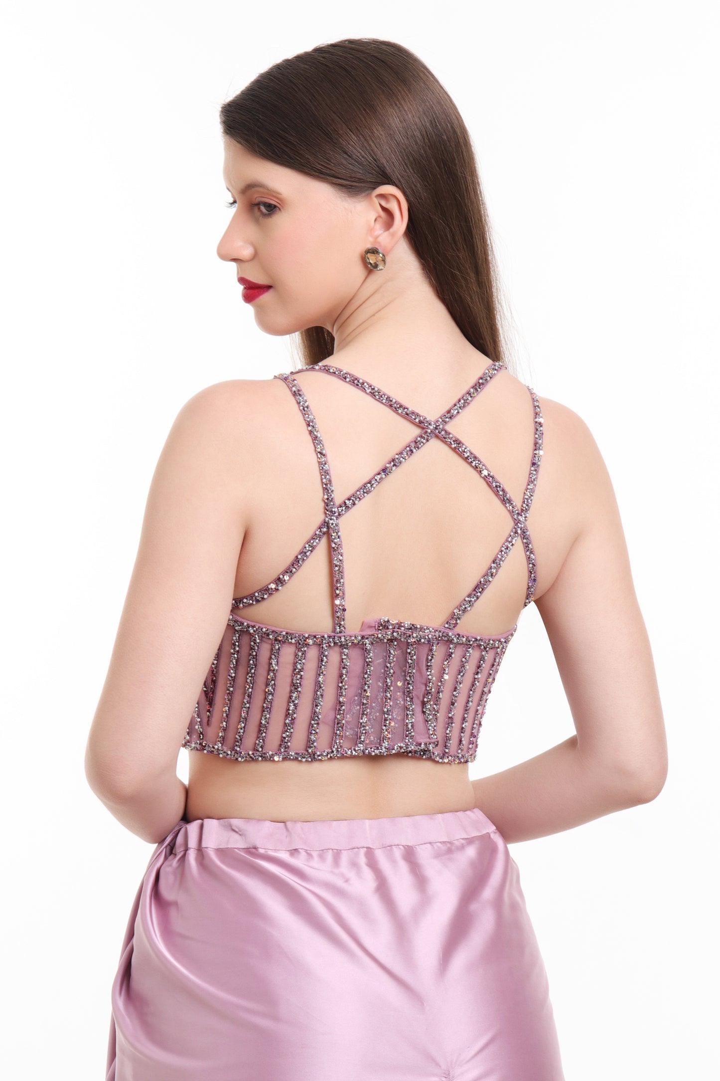 Mauve pre draped saree with embroidered corset blouse