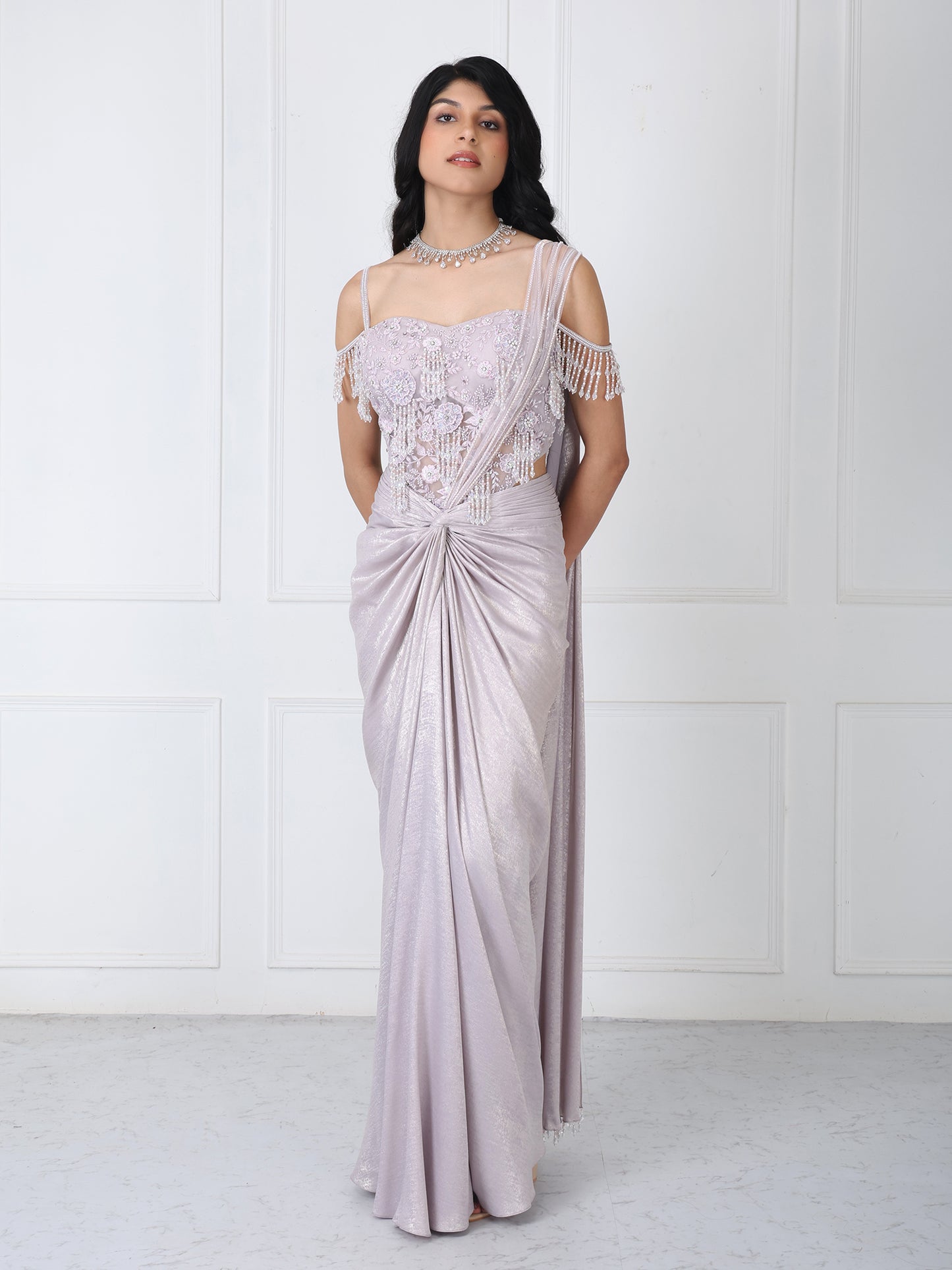 Lilac drape saree with floral embroidered corset