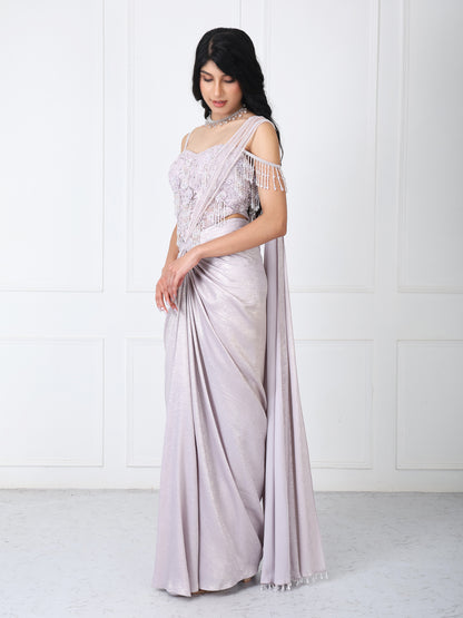 Lilac drape saree with floral embroidered corset