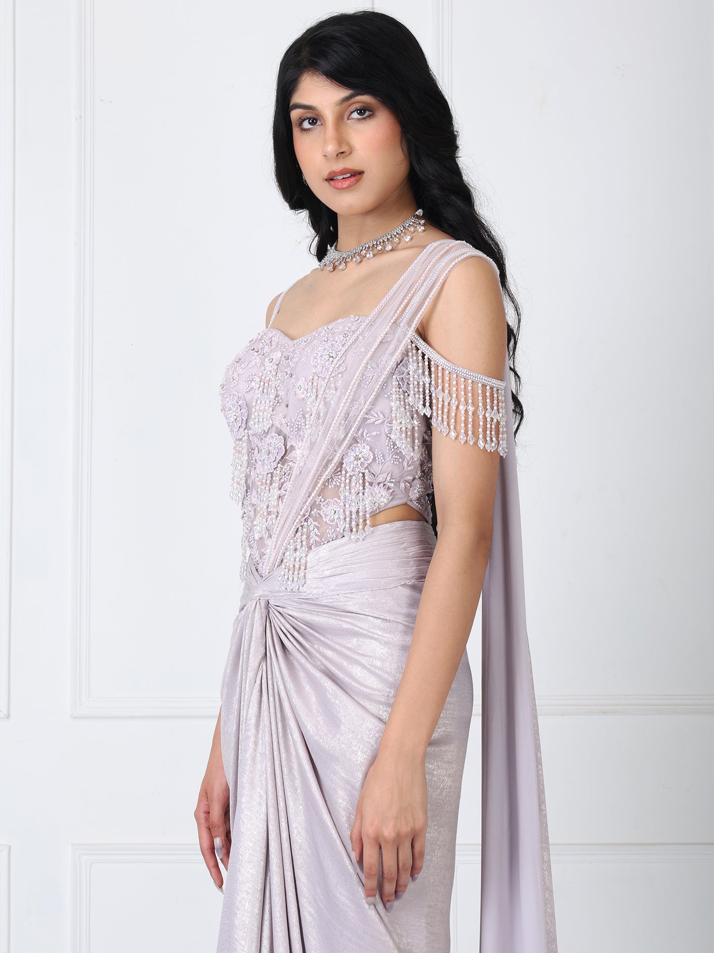 Lilac drape saree with floral embroidered corset