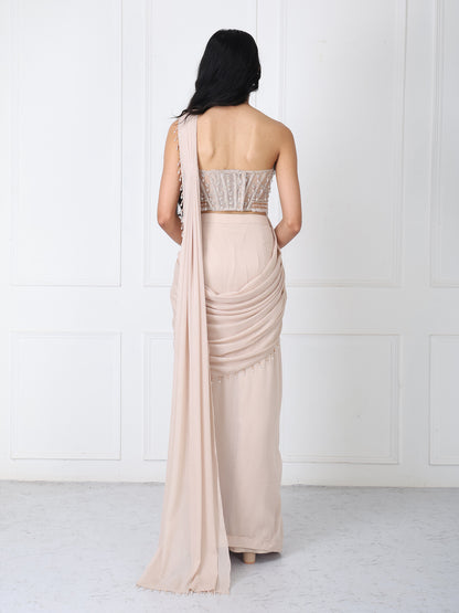 Beige drape saree with floral embroidered corset