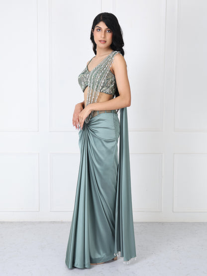 Viridian green drape saree with embroidered blouse