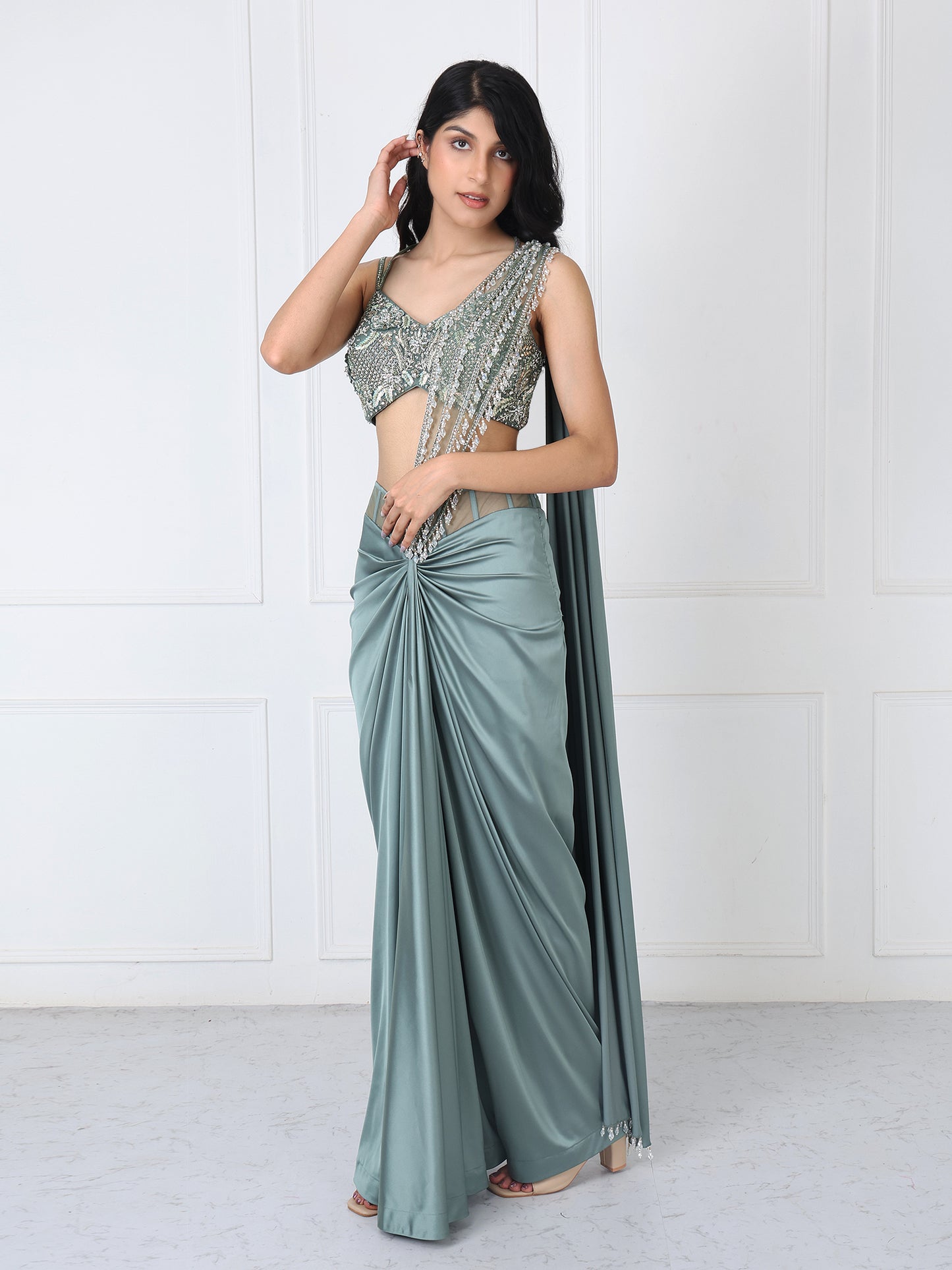 Viridian green drape saree with embroidered blouse