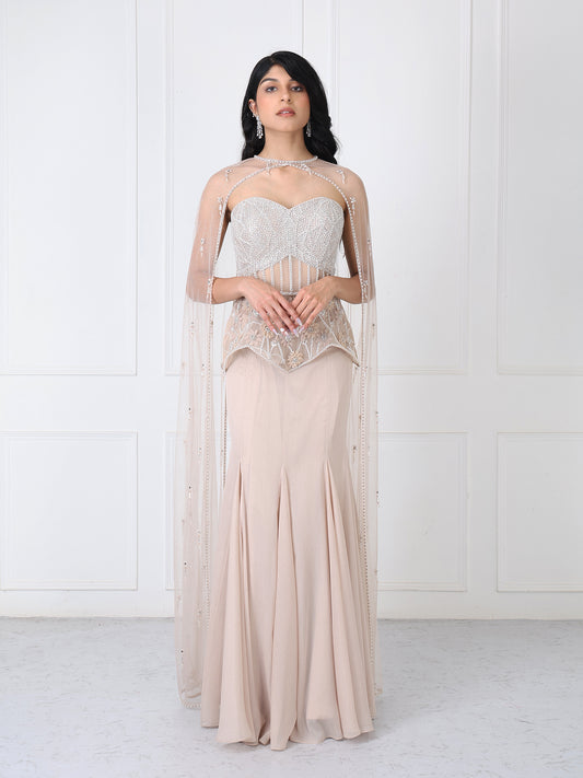 Beige embroidered corset and cape with paneled skirt