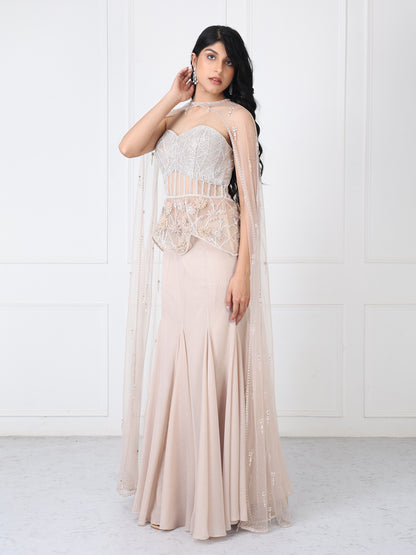 Beige embroidered corset and cape with paneled skirt