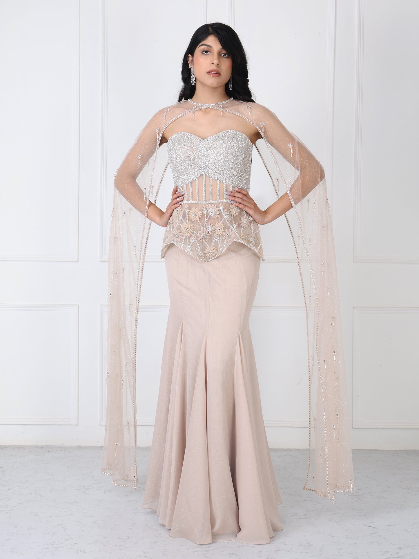 Beige embroidered corset and cape with paneled skirt
