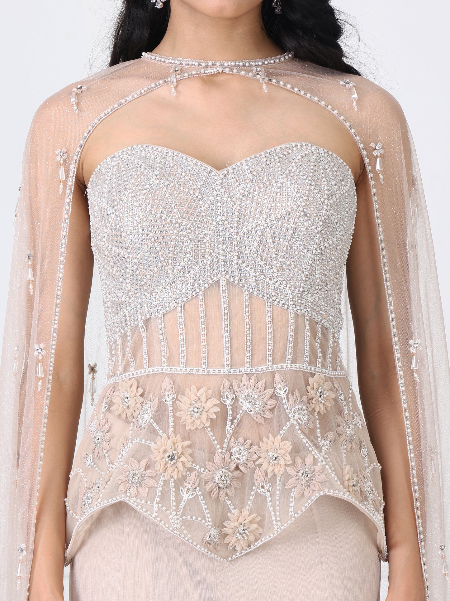 Beige embroidered corset and cape with paneled skirt