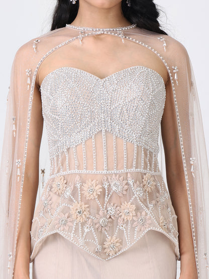 Beige embroidered corset and cape with paneled skirt
