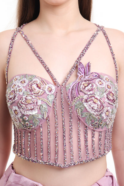 Mauve pre draped saree with embroidered corset blouse