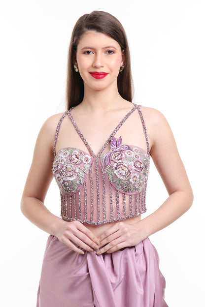 Mauve pre draped saree with embroidered corset blouse